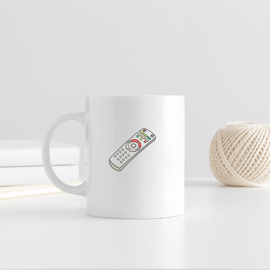 Mug avec icône télécommande relax dessinée, idéal pour un quotidien zen