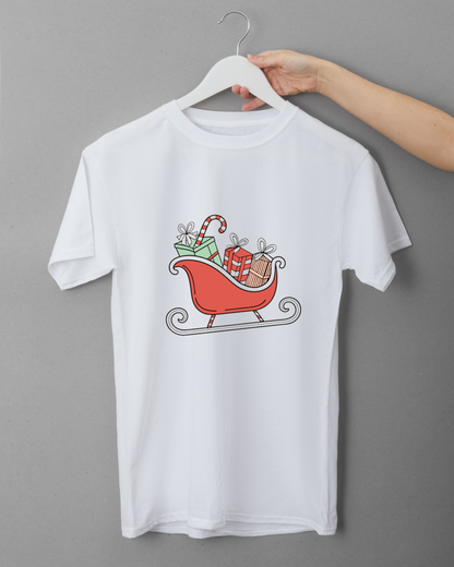T-shirt avec design pastel montrant un traîneau rempli de cadeaux pour Noël