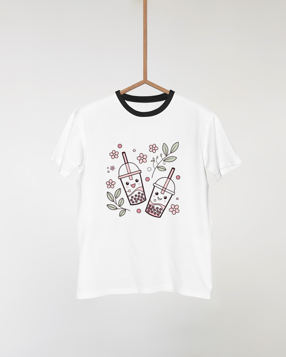 T-shirt avec motif pastel de bubble tea entouré de fleurs, style estival attrayant