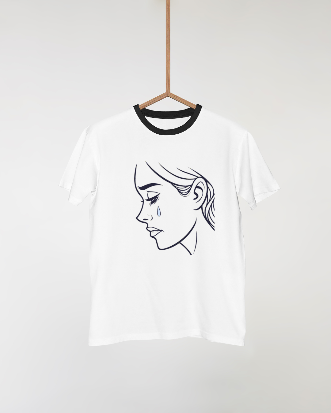 T-shirt avec émoticône stylisée visage triste pour exprimer une émotion humaine