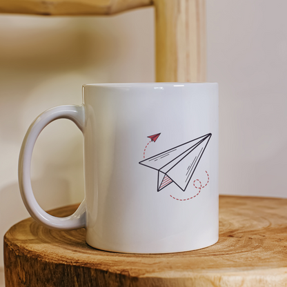 Mug décoré d'un avion en papier élégant, parfait pour les amateurs d'aventure
