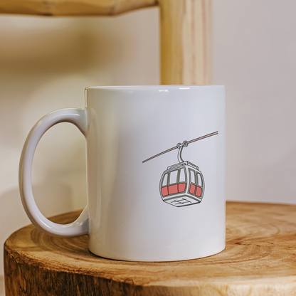 Mug décoré d'une télécabine en mouvement stylisée pour une touche montagnarde