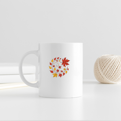 Mug décoré de feuilles colorées représentant le thème automne