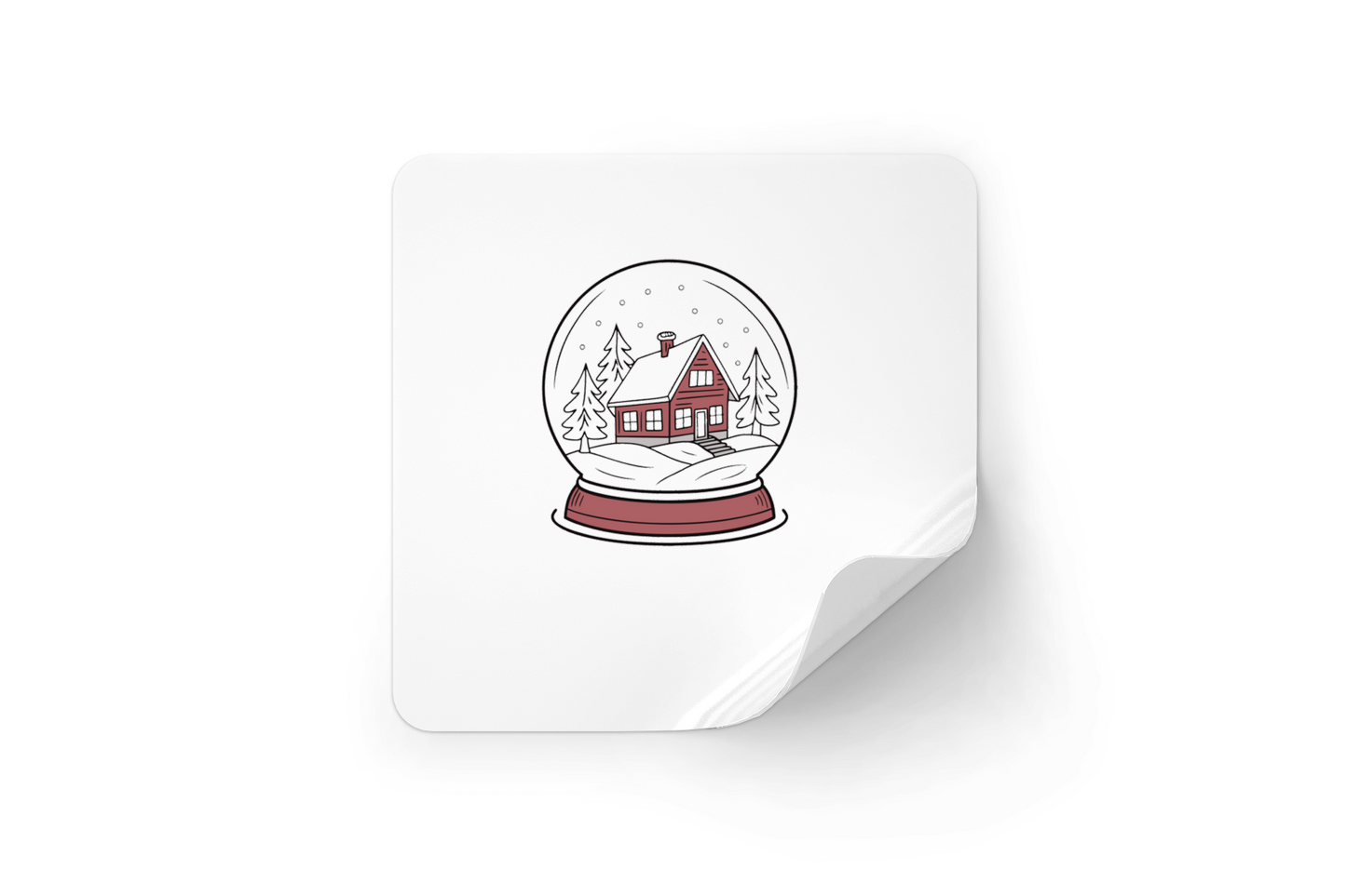 Sticker avec une maison enneigée dans une boule à neige décorative et hivernale