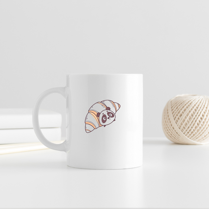 Mug avec un panda joyeux niché dans un croissant, style mignon et gourmand