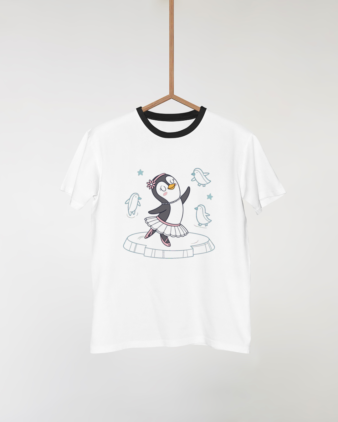 T-shirt avec pingouin dansant thème hiver dans un style doodle amusant