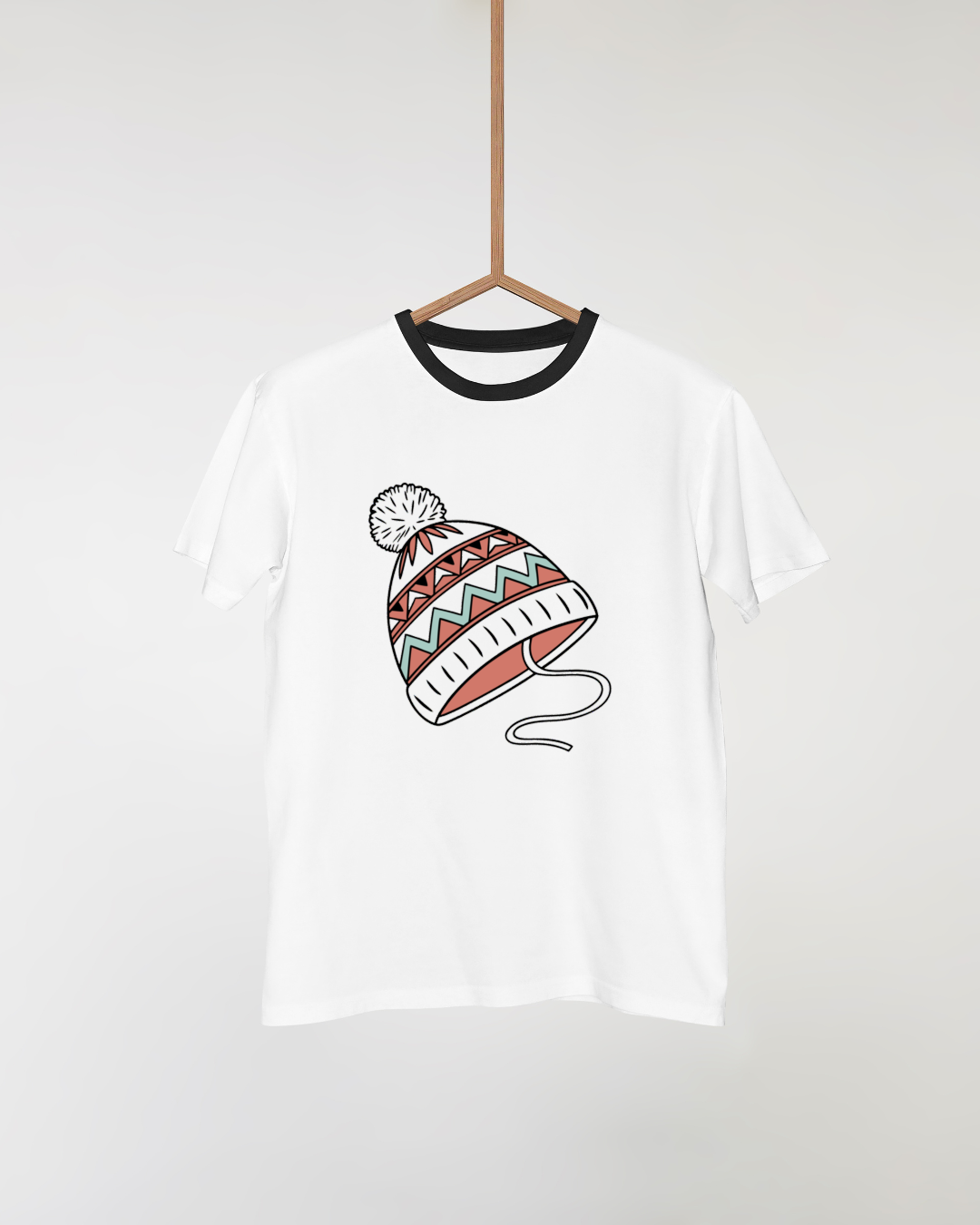 T-shirt décontracté affichant un bonnet aux couleurs pastel pour un look hivernal cosy