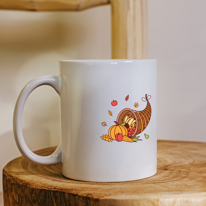 Un mug présentant une icône de corne d'abondance automnale sur fond nature