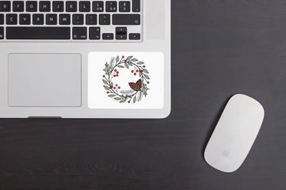 Autocollant festif avec couronne de Noël aux couleurs pastel sur fond neutre