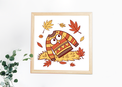 Cadre déco automne avec icône pull et feuilles volant doucement