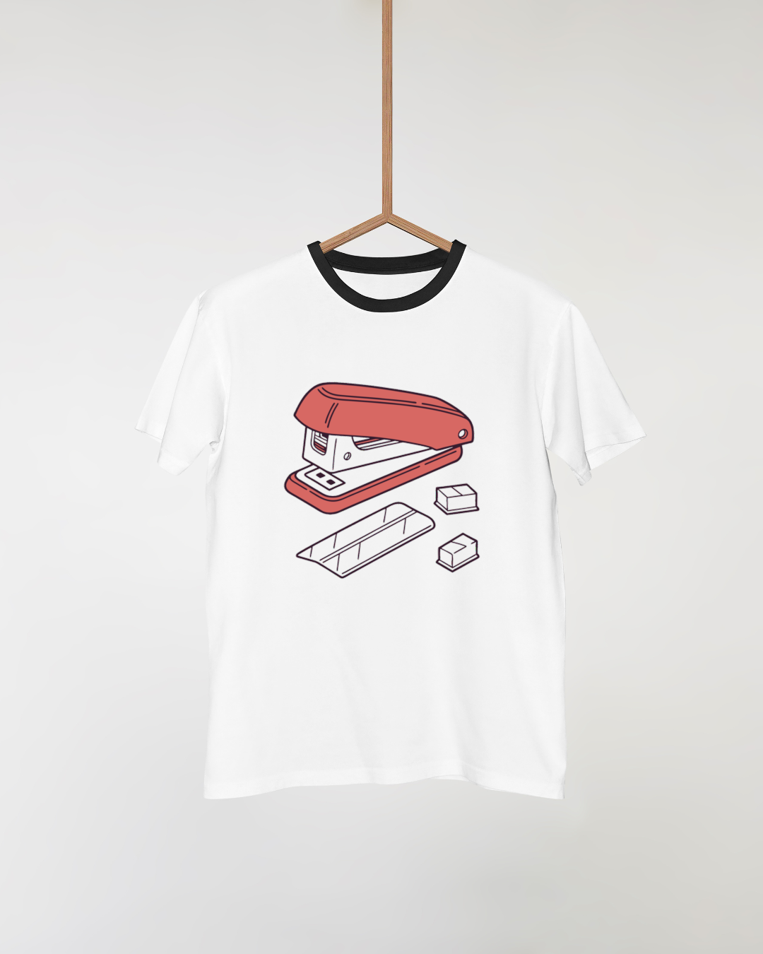 T-shirt avec agrafeuse dessinée style bureau créatif