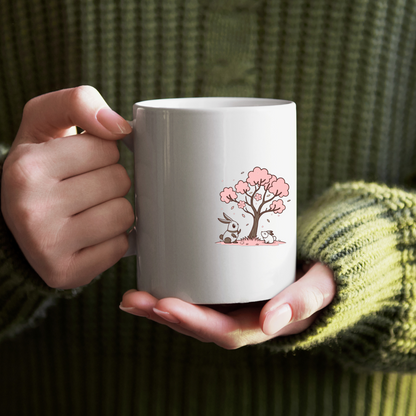 Mug décoré d'un motif kawaii avec des lapins sous un cerisier en fleur