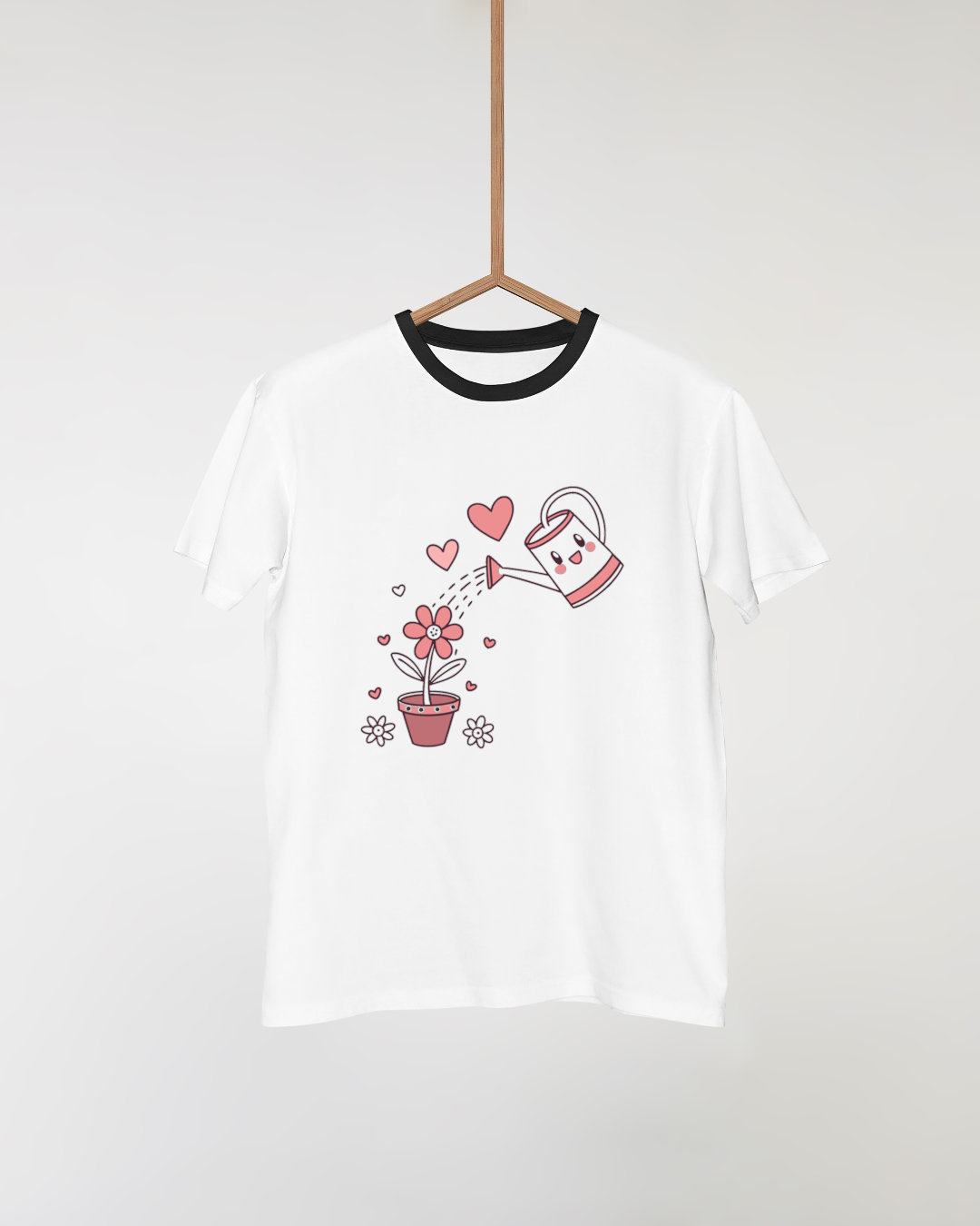 T-shirt avec arrosoir joyeux et fleur épanouie au style kawaii printanier vibrant