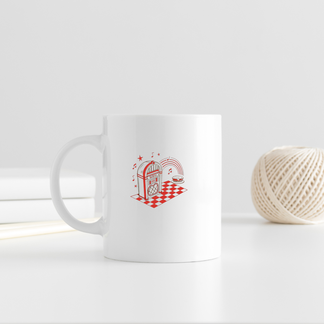 Design jukebox rétro sur mug, idéal pour fan de musique vintage