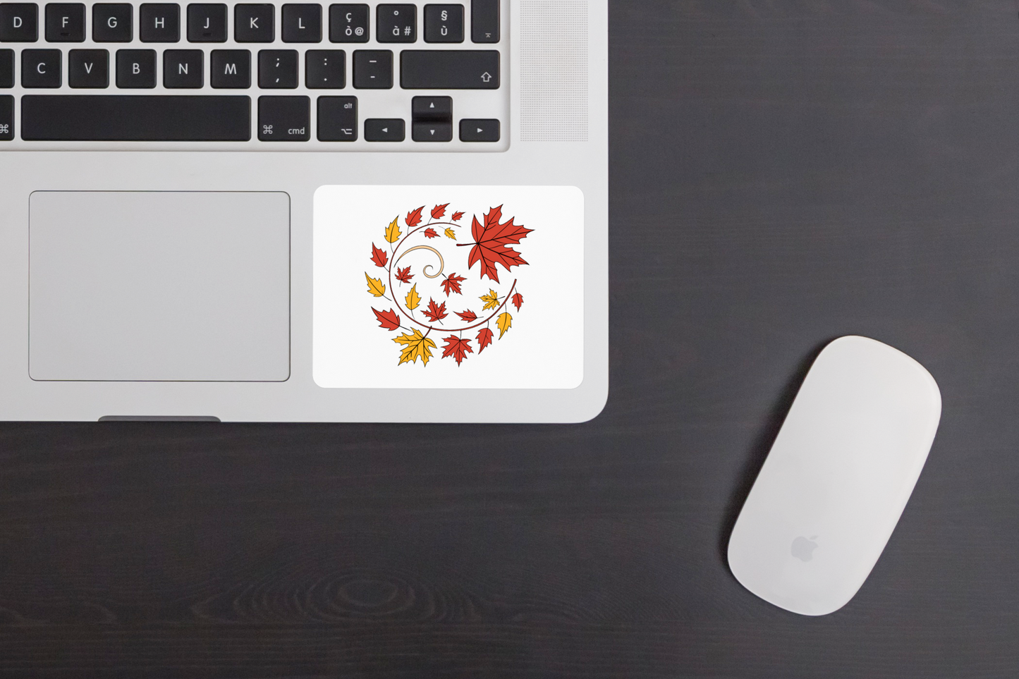 Sticker décoratif avec feuilles stylisées aux couleurs automnales, ambiance tourbillonnante