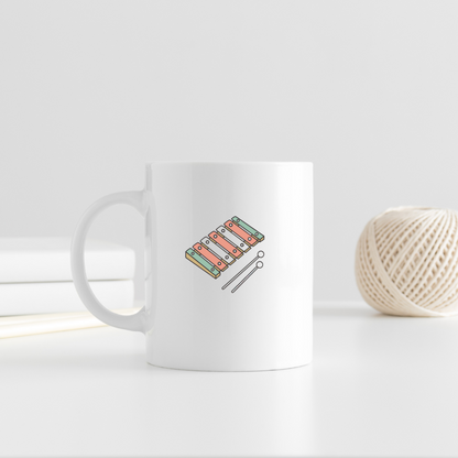 Mug en céramique avec xylophone pastel, design plat ambiance enfantine