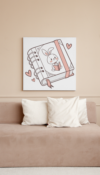 Cadre mignon affichant un lapin pastel charmant en train de lire un livre