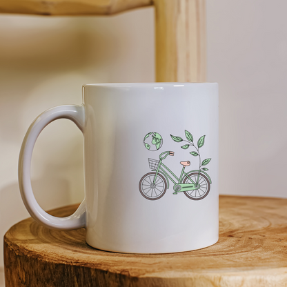 Mug décoré d'un vélo vert sur fond pastel avec feuilles symbolisant l'écologie