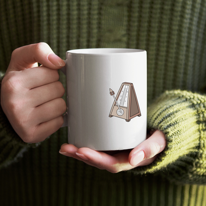 Mug affichant un cartoon numérique d'un métronome en pleine action animateur musical