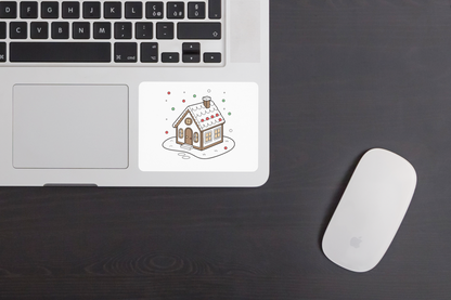 Sticker décoratif représentant une maison de pain d'épices enneigée pour Noël