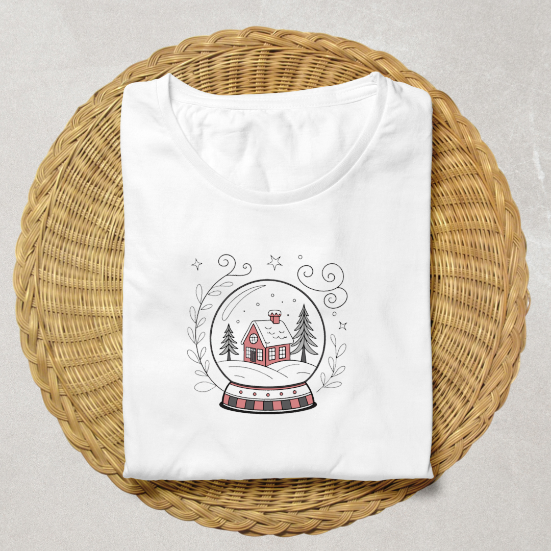 T-shirt hiver avec icône digitale d'une maison enneigée pour un style cozy rayonnant