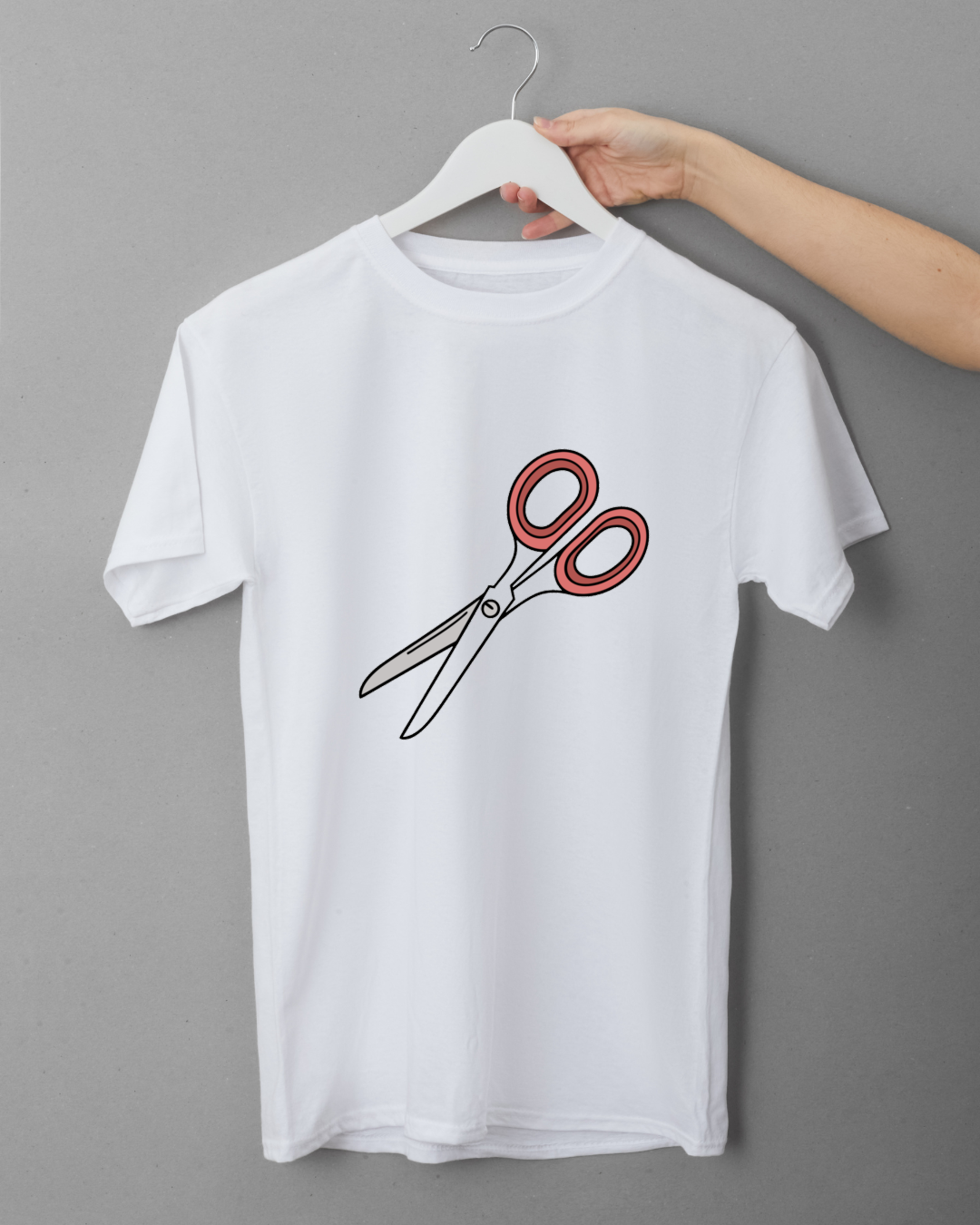 T-shirt créatif affichant des ciseaux élégants dans un design minimaliste et épuré
