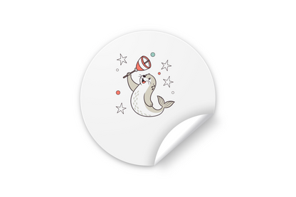 Sticker festif avec un phoque et étoiles, style cartoon avec cloche joyeuse