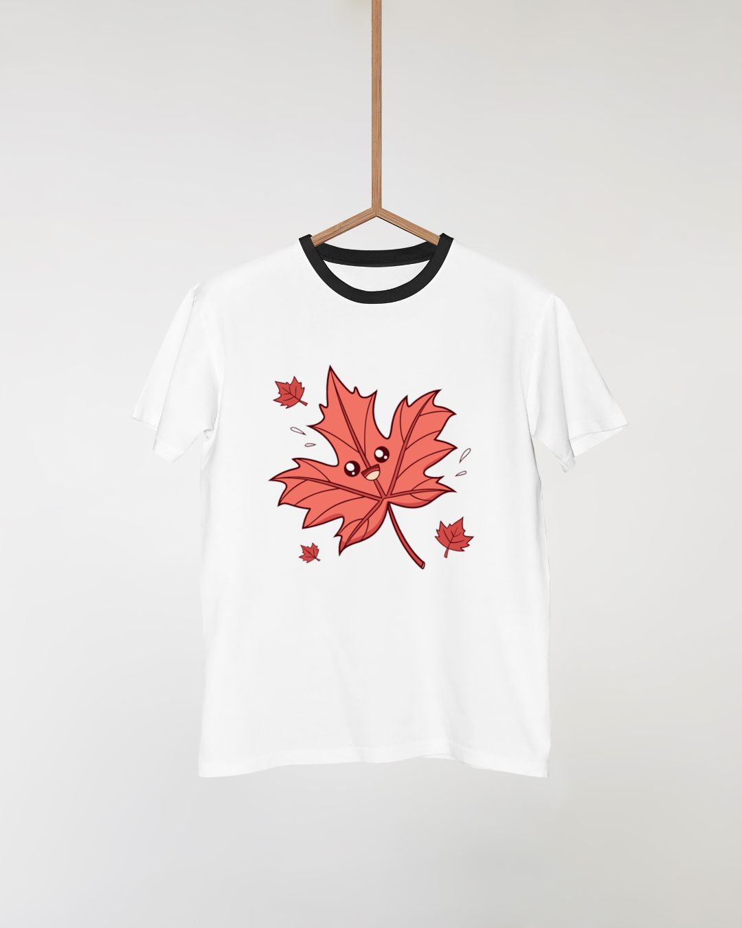 T-shirt avec feuille souriante dans un style kawaii automnal
