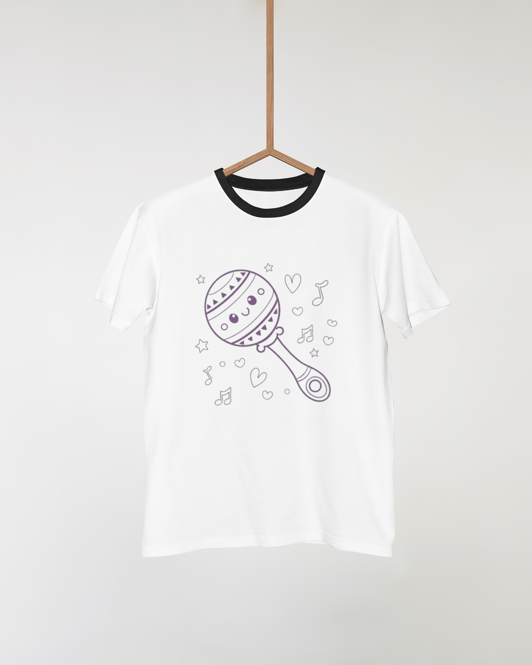 Illustration kawaii de maracas sur tee-shirt, style adorable pour mode enfant.