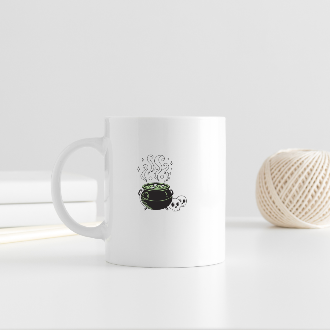 Mug illustré avec un chaudron bouillonnant pour Halloween ambiance enchantée