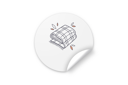 Sticker sur fond blanc avec icône doodle d'une écharpe automne cosy enroulée