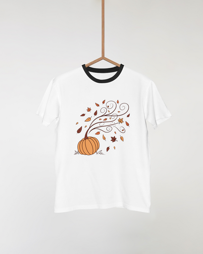T-shirt automne orné d'une citrouille magique avec feuilles virevoltantes