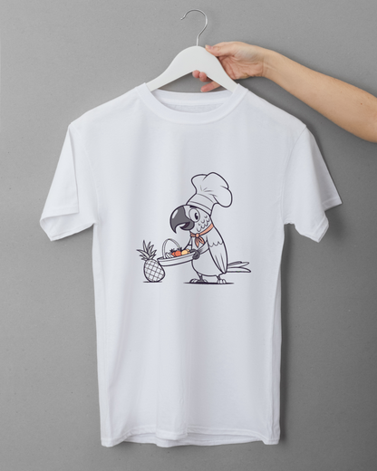 T-shirt tropical amusant avec un perroquet chef coloré et panier de fruits.