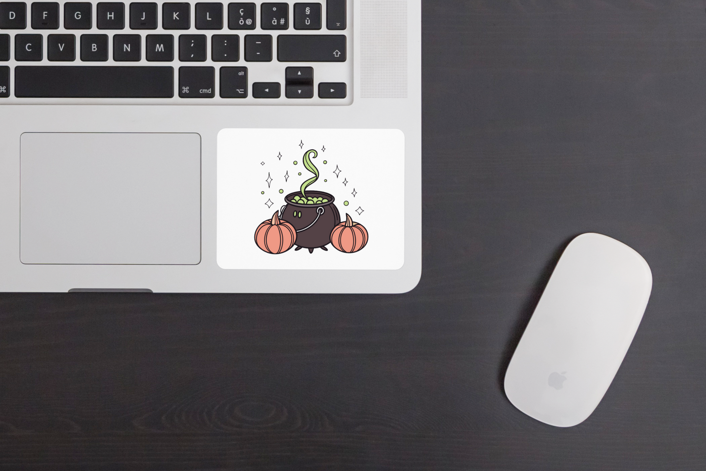 Sticker décoratif avec un chaudron magique fumant, parfait pour Halloween
