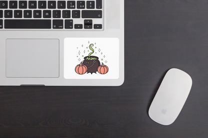 Sticker décoratif avec un chaudron magique fumant, parfait pour Halloween
