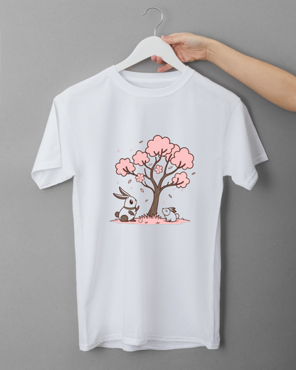 T-shirt kawaii avec lapins sous cerisier en fleur pour célébrer le printemps
