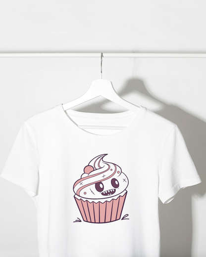 T-shirt amusant avec un cupcake monstre souriant, idéal pour une fête colorée
