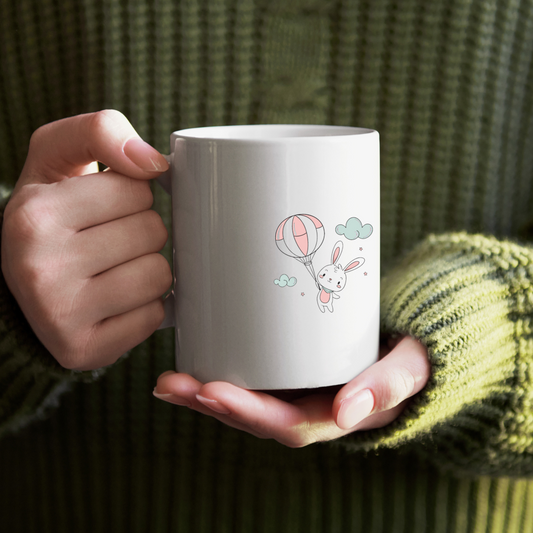 Illustration mug de lapin gonflant un ballon en ciel pastel