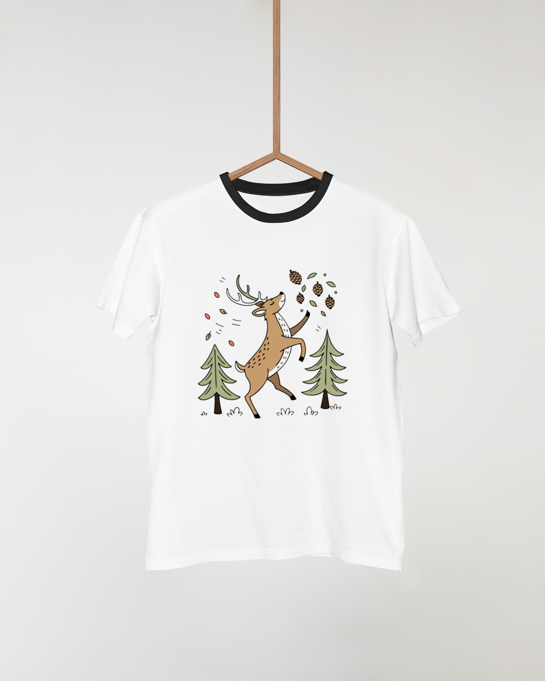 T-shirt design cerf festif dans bois pommes de pin