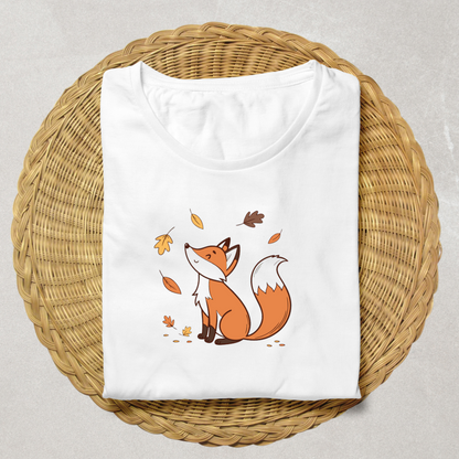 T-shirt automnal décoré d'un renard joyeux niché parmi des feuilles colorées
