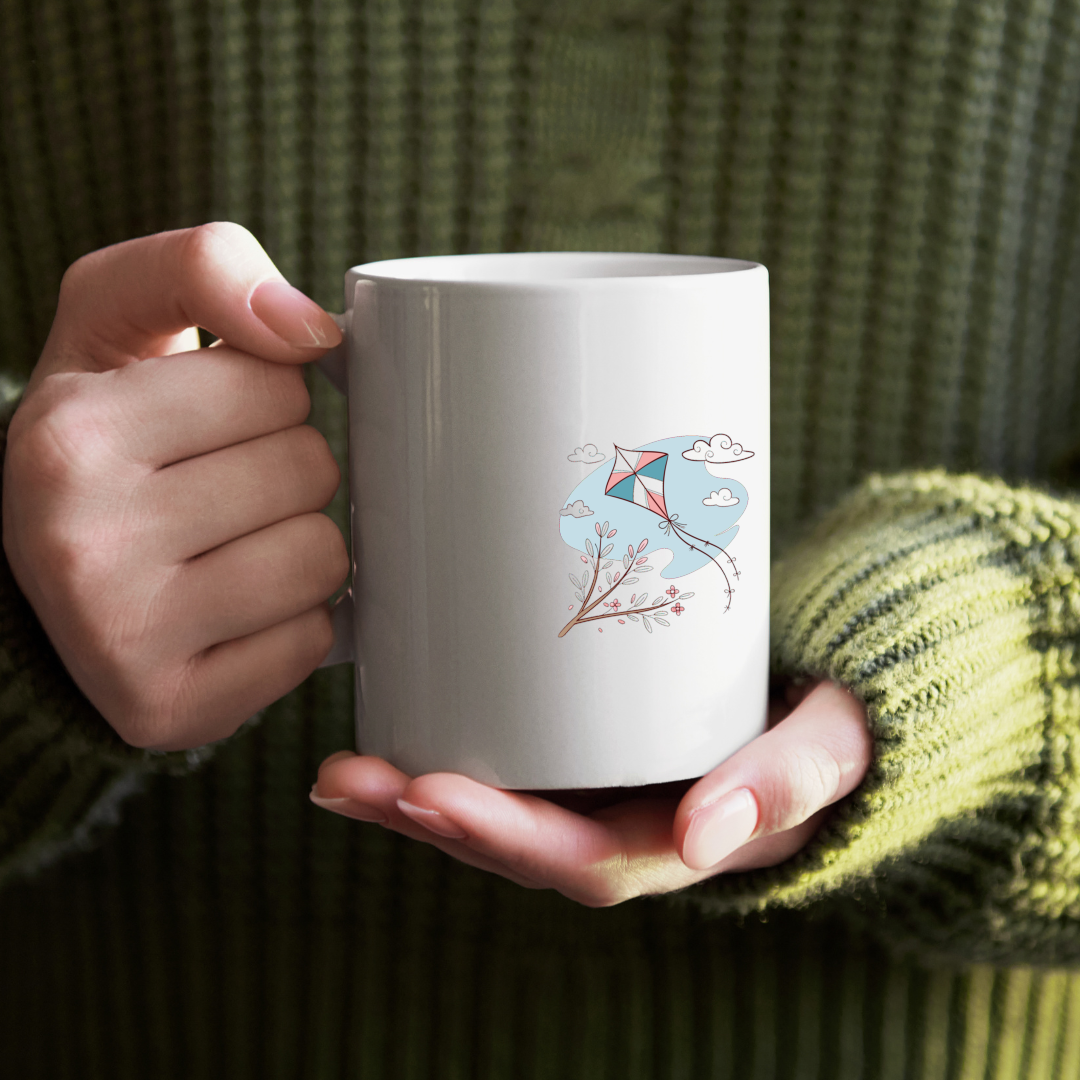 Mug avec une icône douce de cerf-volant flottant pour une ambiance printanière