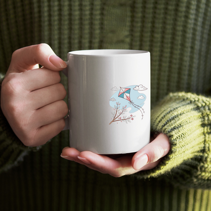 Mug avec une icône douce de cerf-volant flottant pour une ambiance printanière