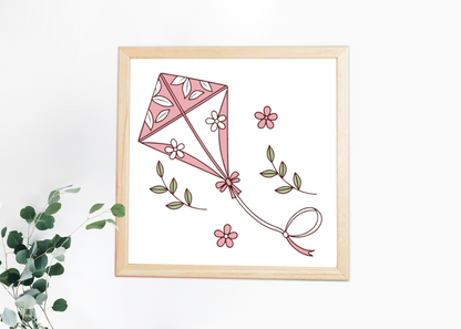 Cadre pastel avec cerf-volant fleuri, ambiance printanière et enchantée