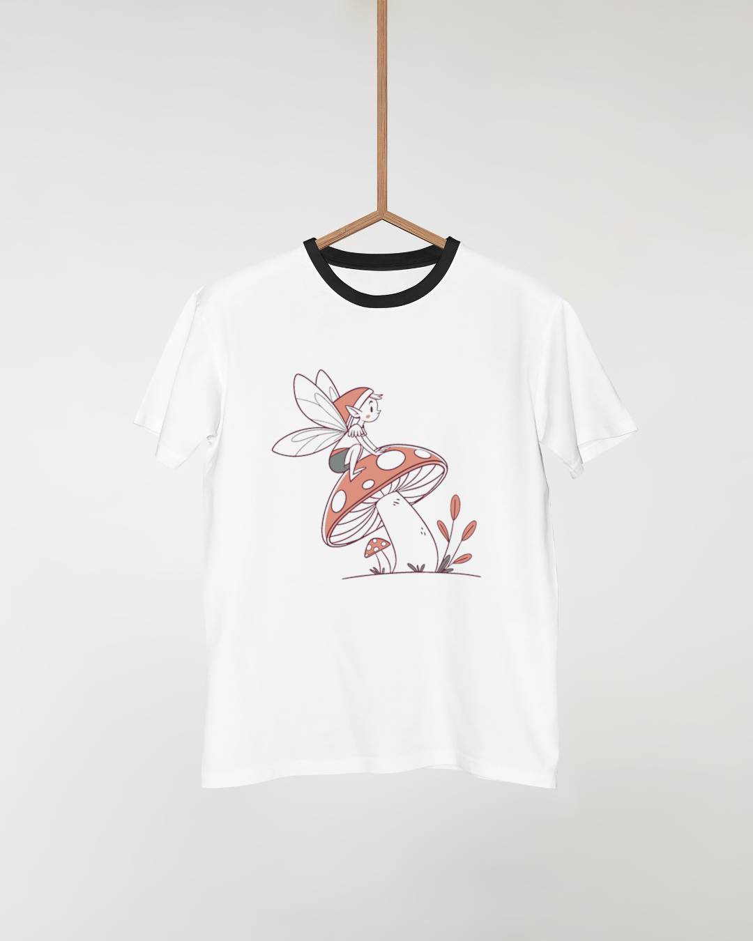Un t-shirt ornant fée rêveuse pastel sur champignon dans une ambiance enchantée
