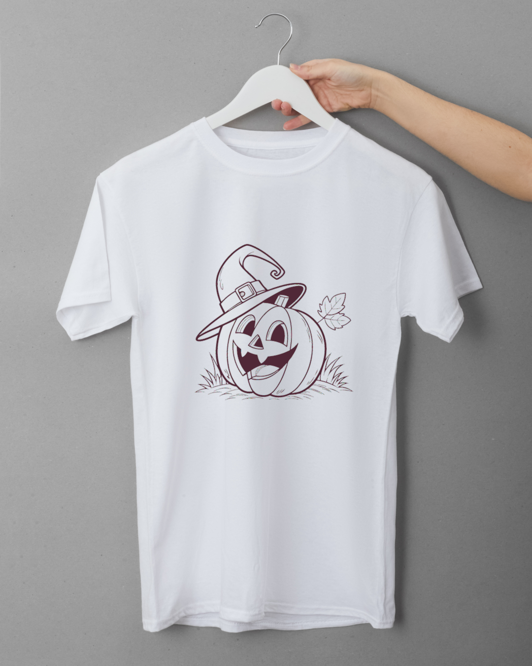 T-shirt Halloween avec citrouille riante monochrome dans un style fantaisiste