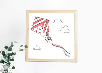 Cadre affichant un cerf-volant coloré sous un ciel estival avec nuances pastel