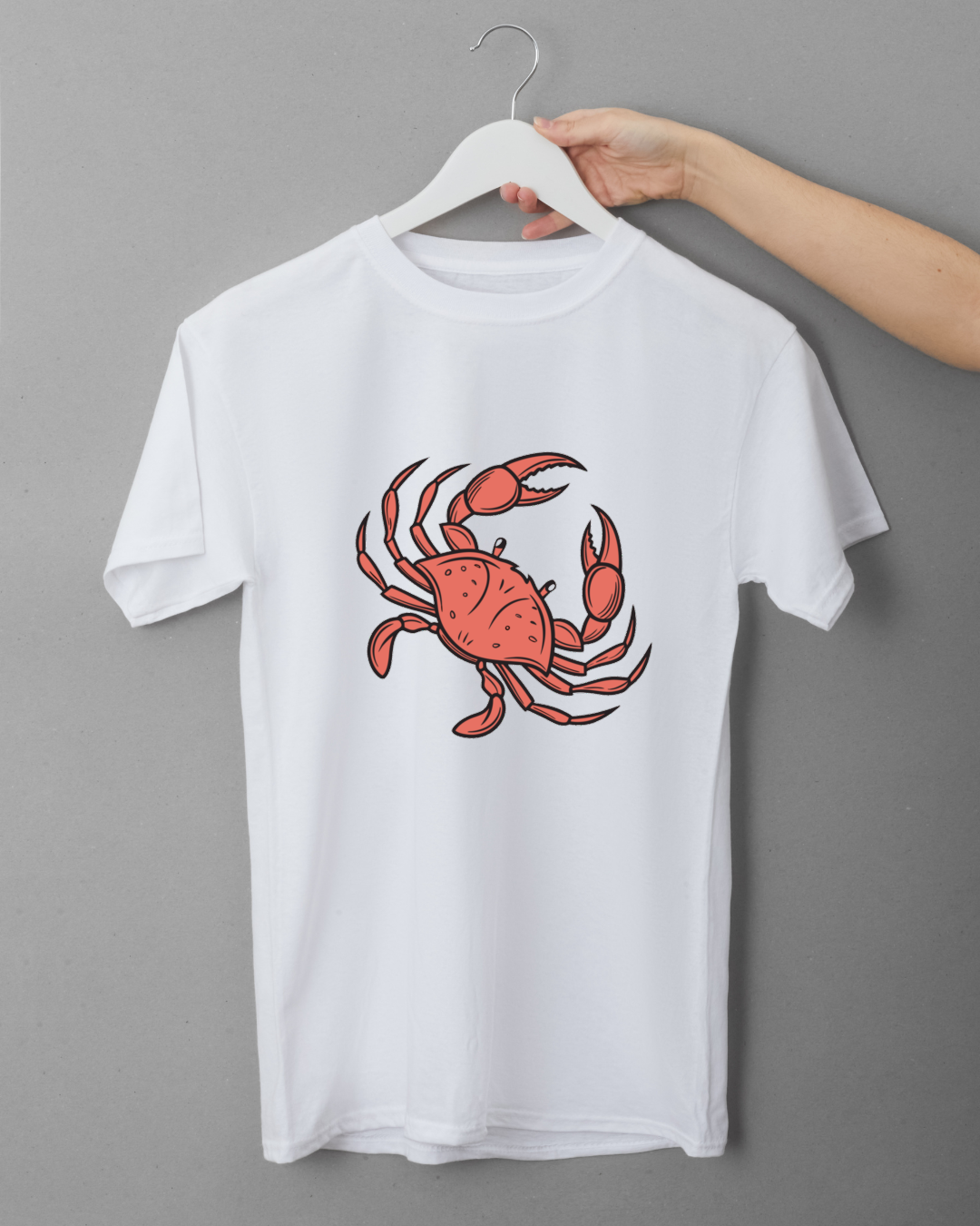 T-shirt aux tons marins avec un dessin ludique de crabe curieux en style graphique
