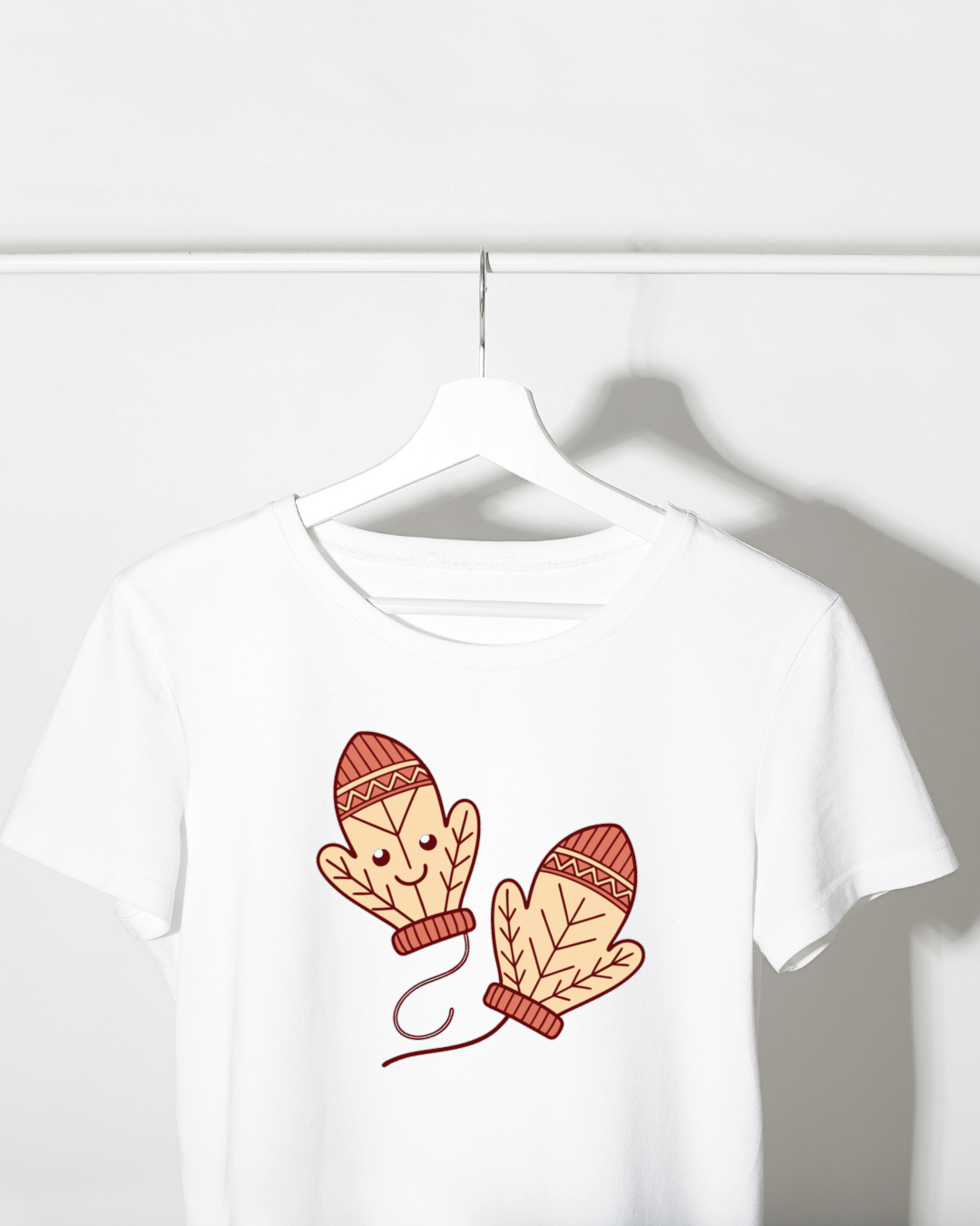 T-shirt avec motif de moufles joyeuses sur fond hivernal style cartoon