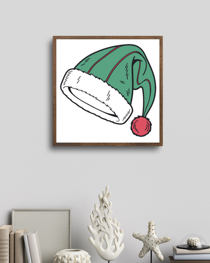 Cadre festif avec chapeau de Noël coloré, parfait pour une déco joyeuse et unique