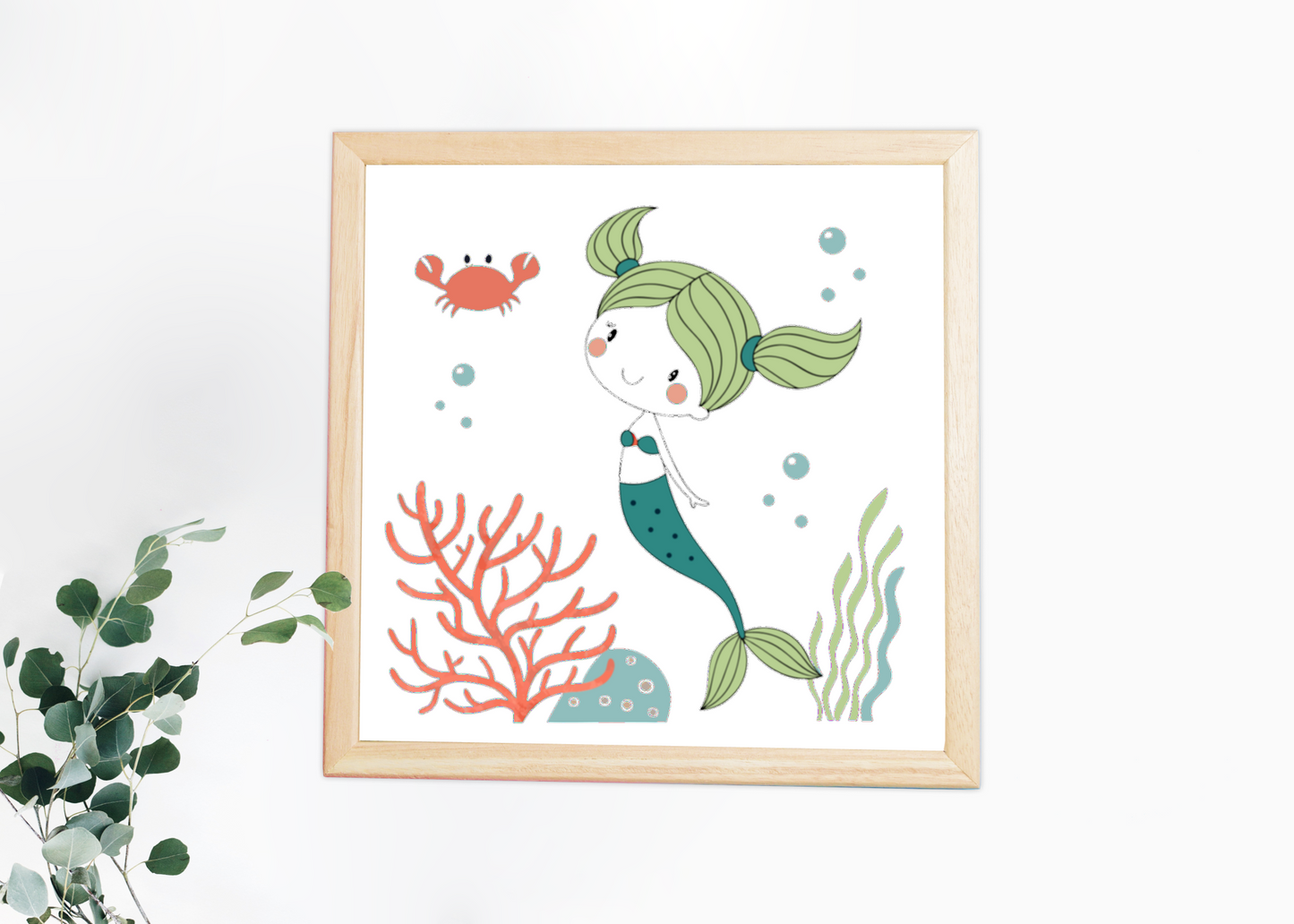 Cadre décoratif évoquant le monde marin avec une sirène dessinée dans un style cartoon